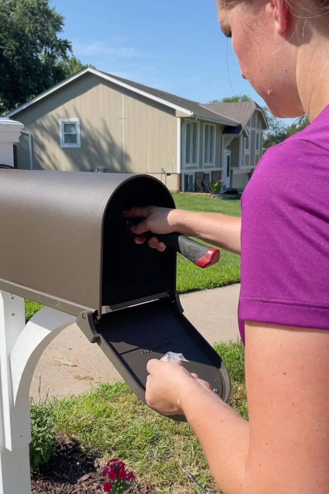Attaching mailbox to a post.